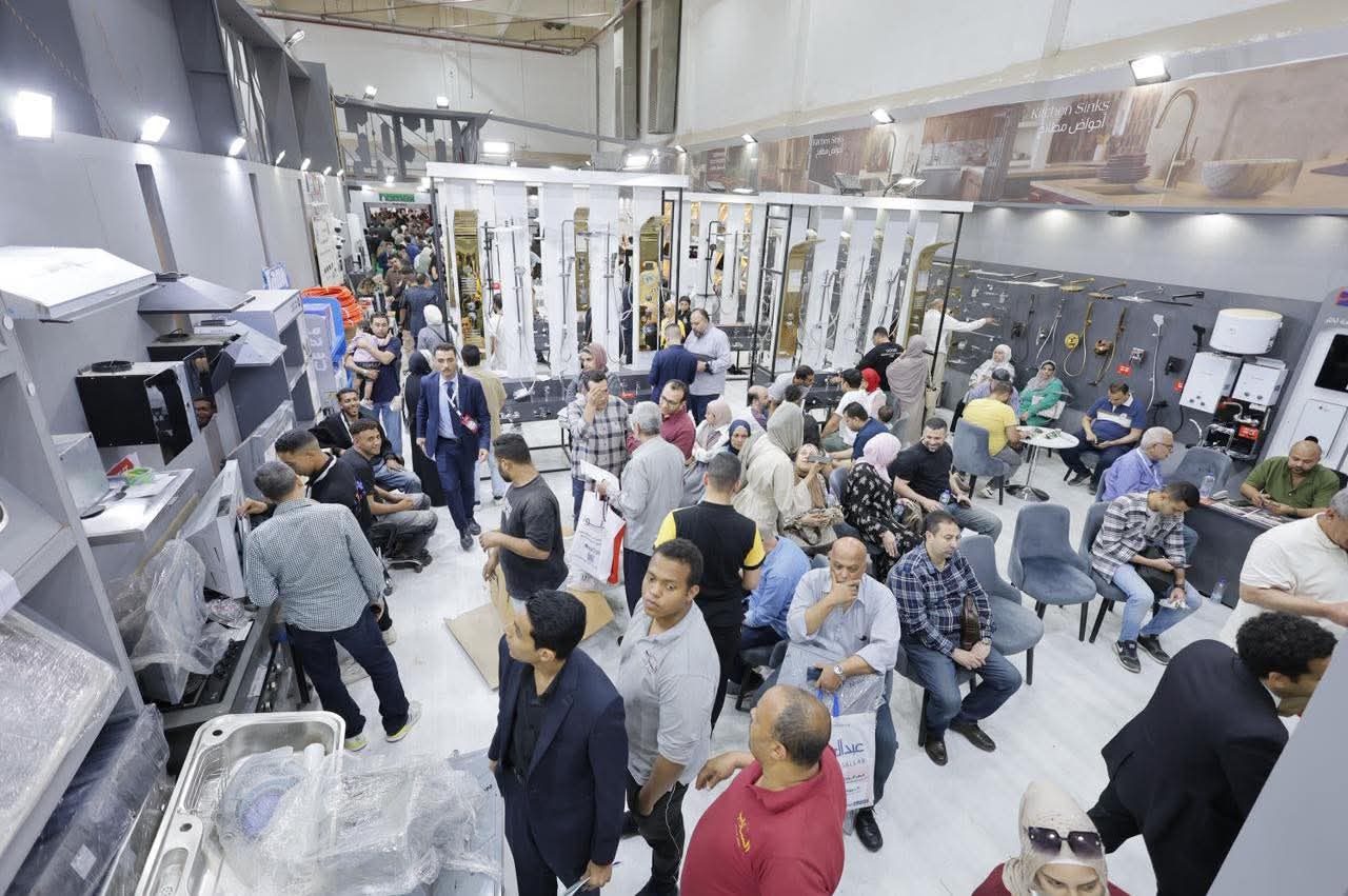 Buyers seated with exhibitor staff to close their orders